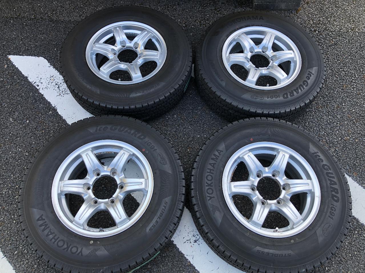 Manufacturer unknown 6-spoke aluminum wheels + YOKOHAMA ice GUARD iG91