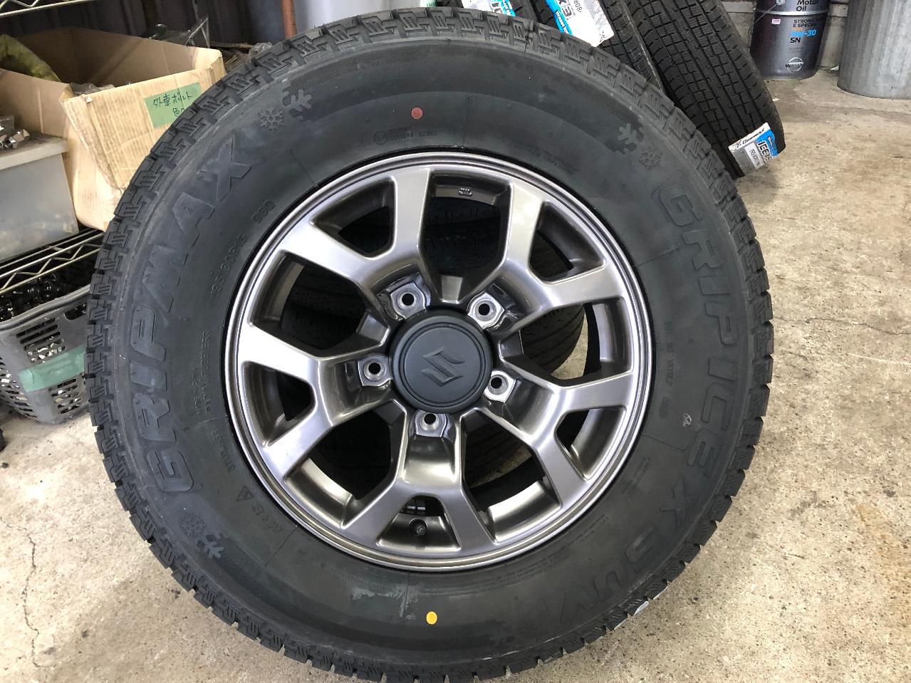 Suzuki genuine JB 74 Jimny Sierra original aluminum wheel + GRIPMAX ICE X SUV Fifty