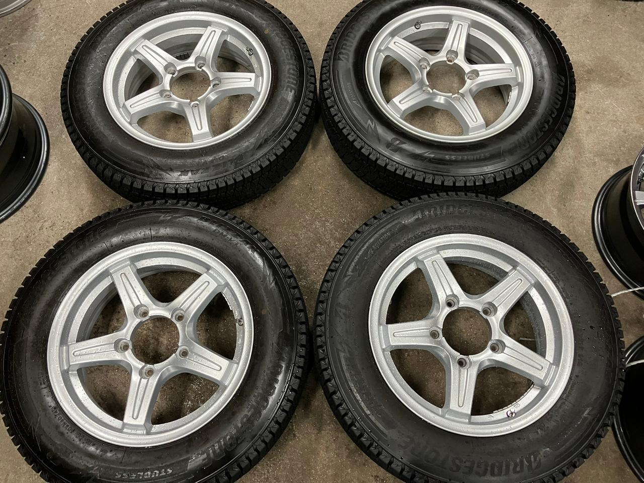 Manufacturer unknown 5-spoke + BRIDGESTONE BLIZZAK DM-V3
