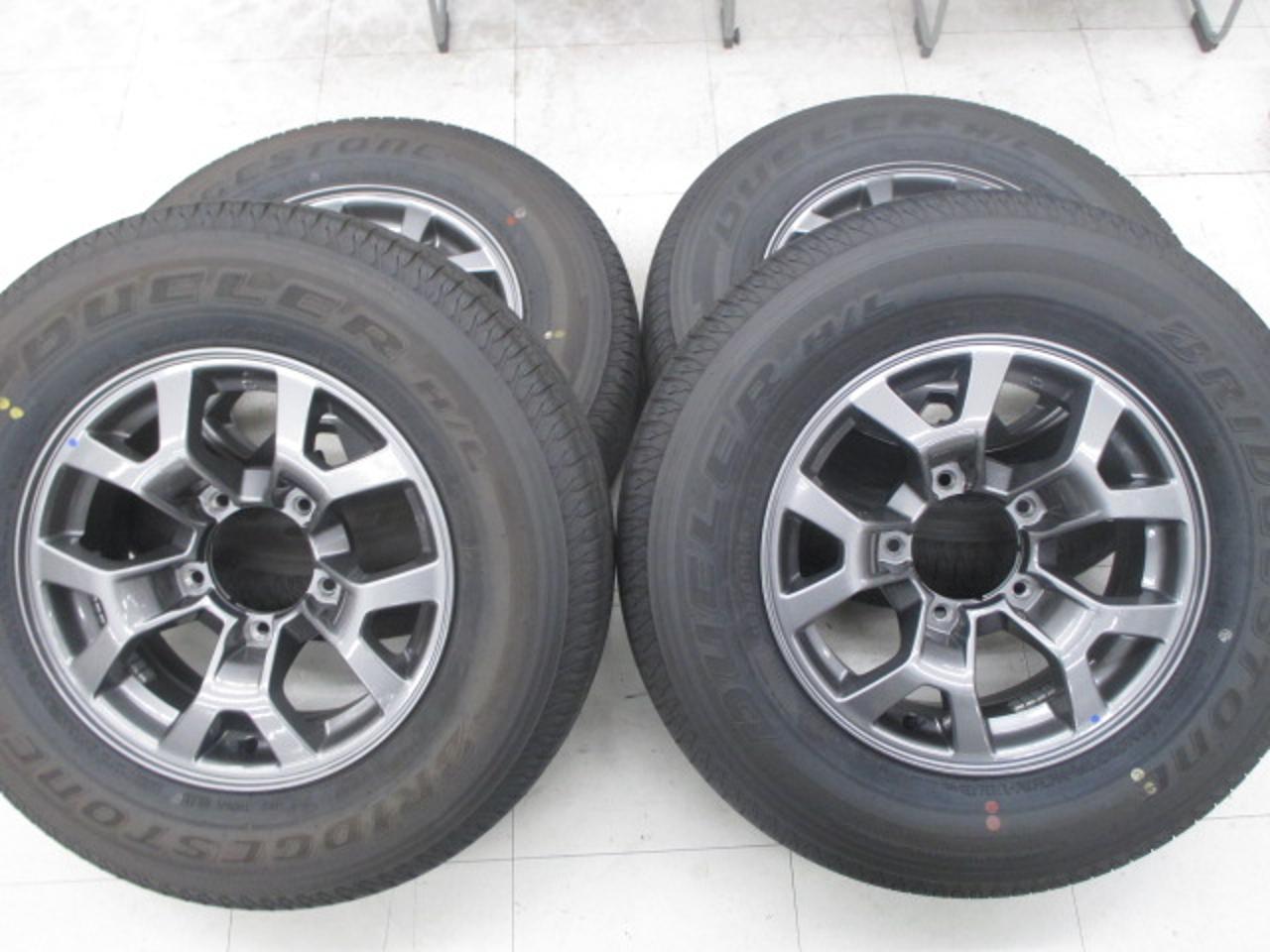 Genuine Suzuki parts JB 74 Jimny Sierra genuine wheels + BRIDGESTONE DUELER H / L 852