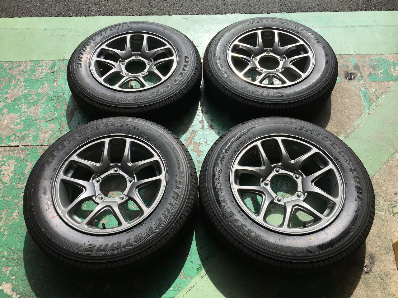SUZUKI JB64W Jimny XC Grade Genuine Alloy Wheels + BRIDGESTONE DUELER H/L852