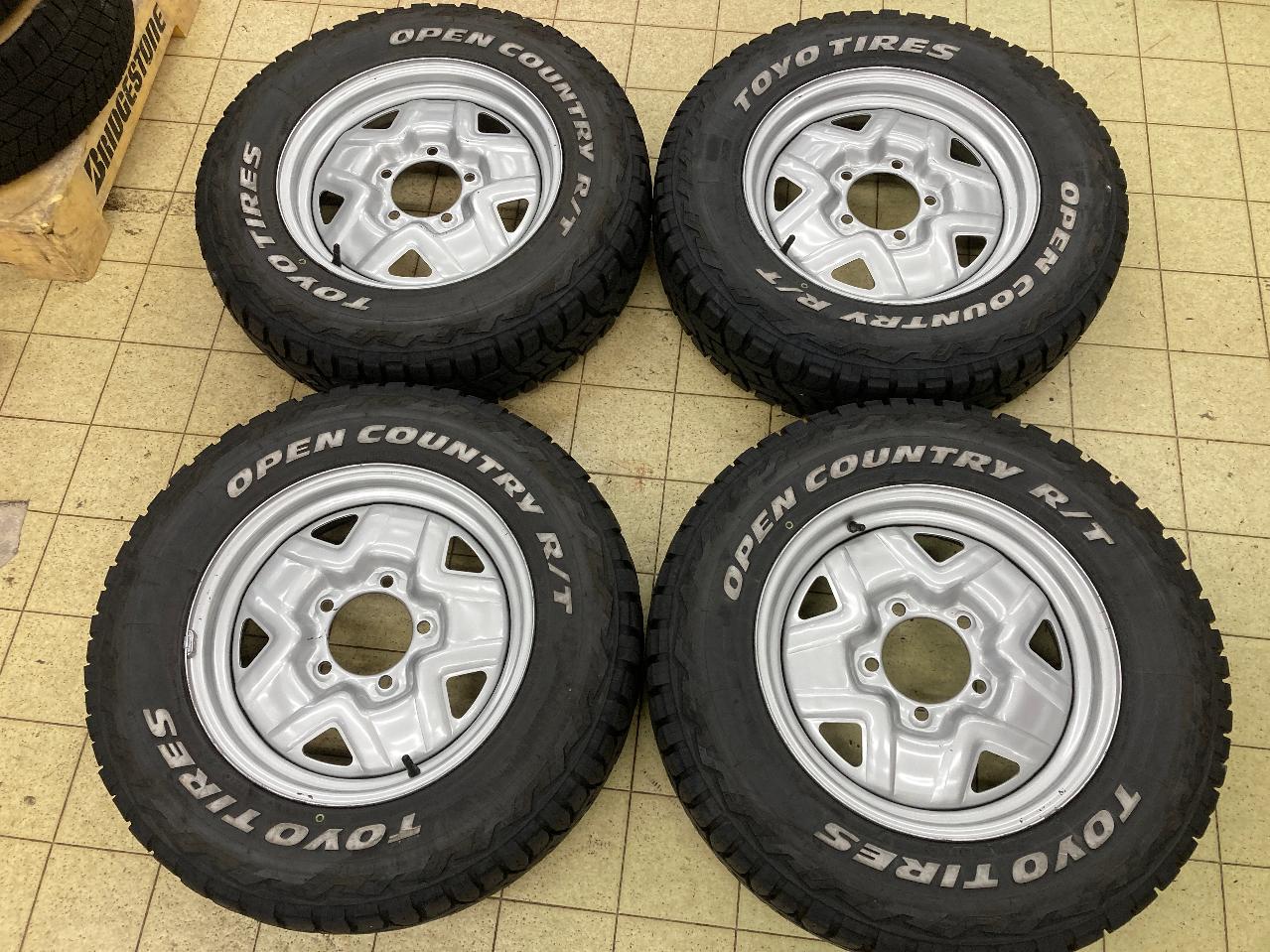 Genuine Suzuki parts JB23 genuine steel + TOYO OPEN COUNTRY R / T