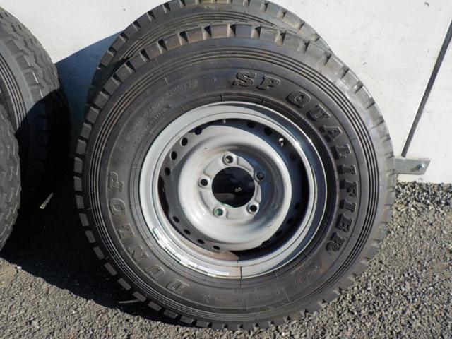 コンテナ1 TOYOTA 再販70ランドクルーザー純正リングスチール + DUNLOP 