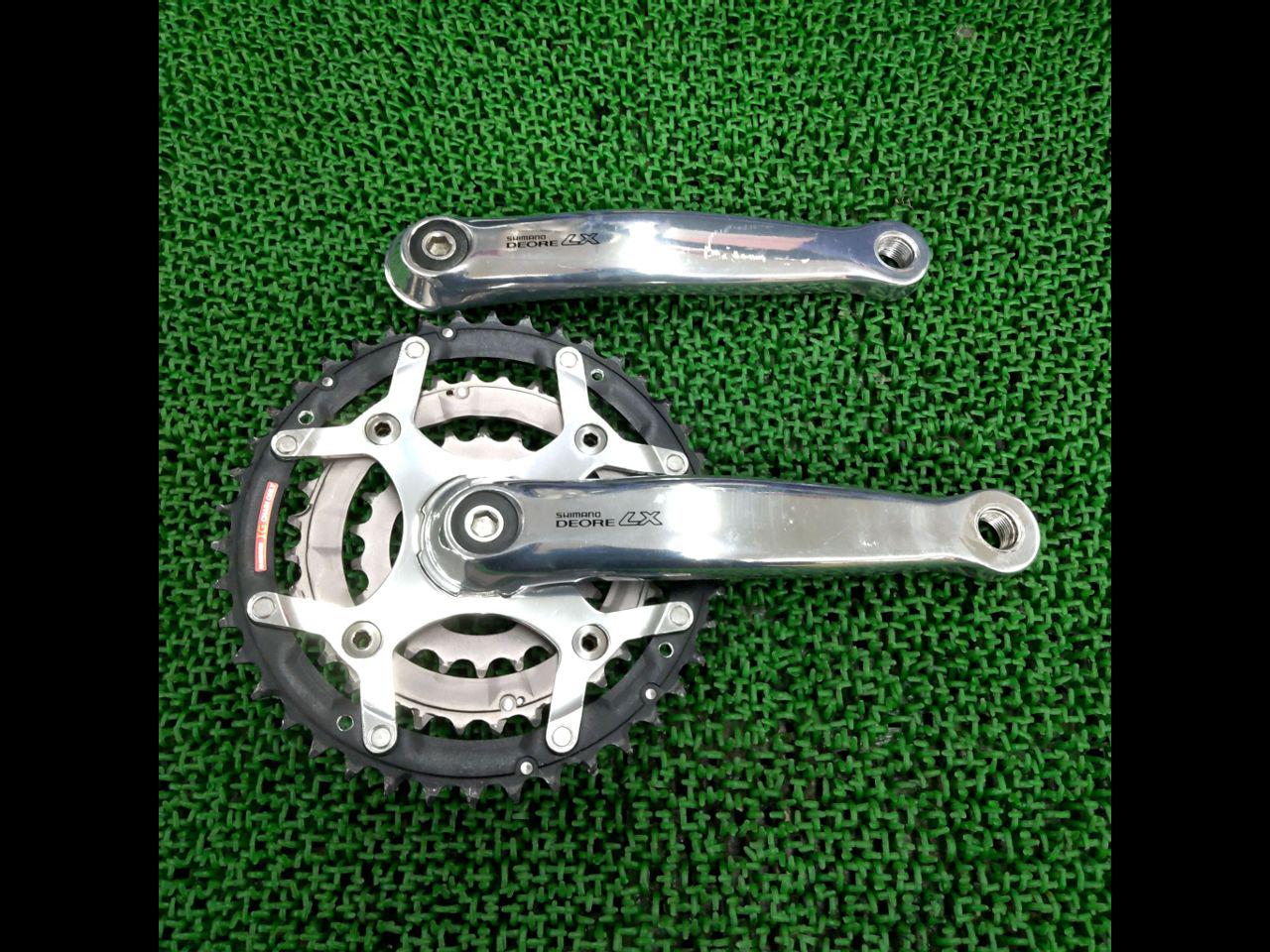 Pédalier Shimano Deore LX FC-M569 - Triple Plateau 22/32/42T - Longueur 175 Mm - Occasion (bon état)