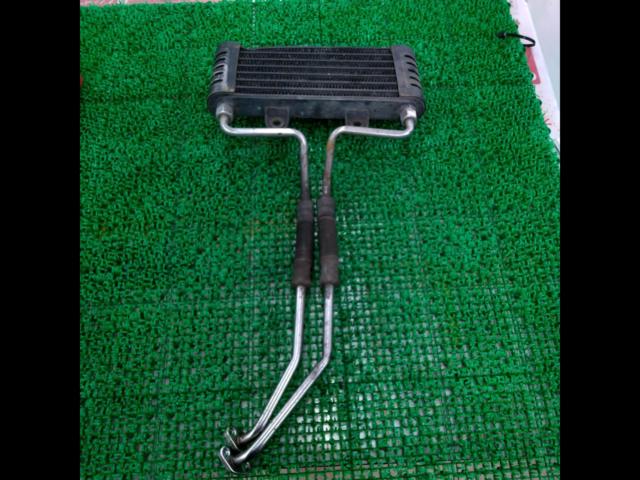 A Kawasaki genuine oil cooler with a minor issue.
Zephyr 400 ??