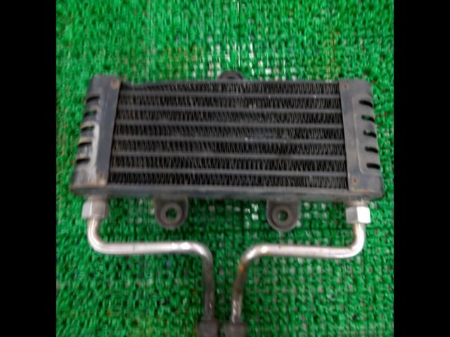A Kawasaki genuine oil cooler with a minor issue.
Zephyr 400 ??