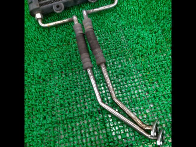 A Kawasaki genuine oil cooler with a minor issue.
Zephyr 400 ??