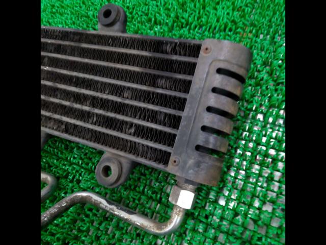 A Kawasaki genuine oil cooler with a minor issue.
Zephyr 400 ??