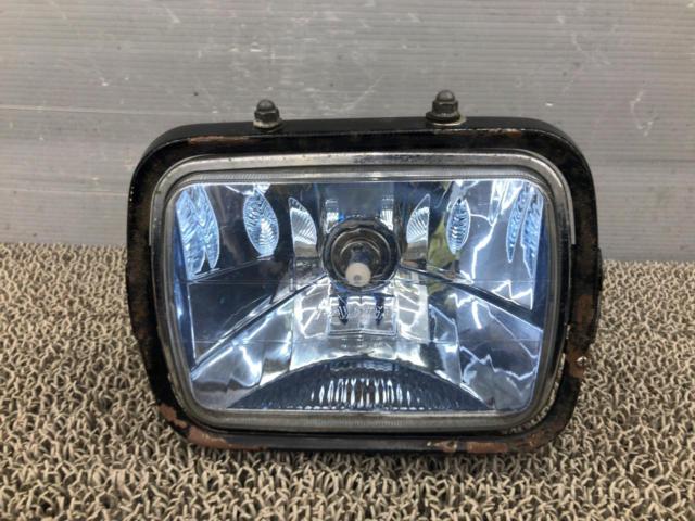 RAYBRIG
Multi-reflector headlight