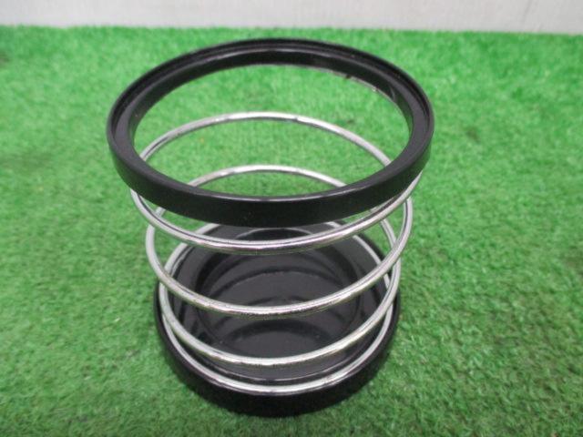 Treasure discovered, manufacturer unknown.
Drink holder
Spring