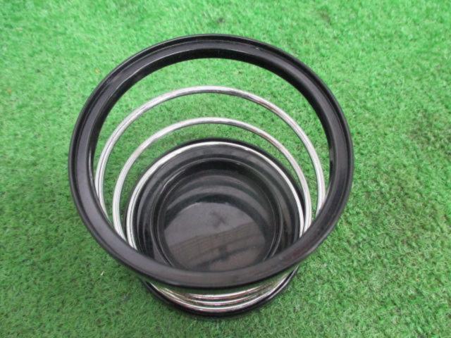 Treasure discovered, manufacturer unknown.
Drink holder
Spring