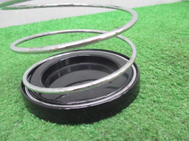 Treasure discovered, manufacturer unknown.
Drink holder
Spring