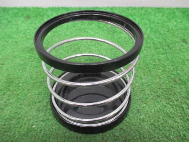 Treasure discovered, manufacturer unknown.
Drink holder