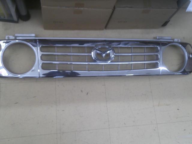 Mazda
Genuine front grille for Spiano HE21S