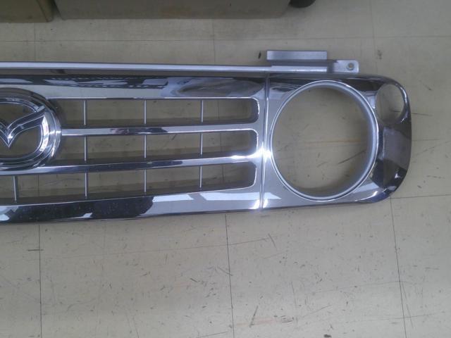 Mazda
Genuine front grille for Spiano HE21S