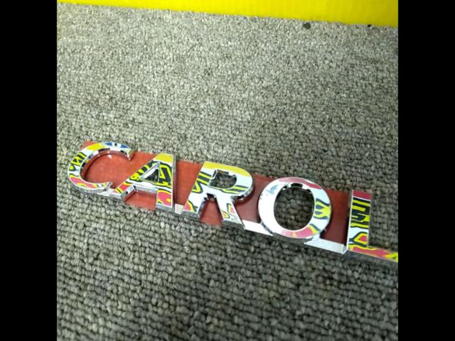 Mazda genuine
CAROL emblem