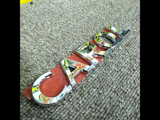 Mazda genuine
CAROL emblem