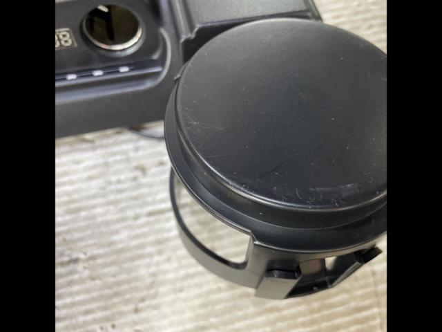 Unknown manufacturer drink holder + power port unit for 200 Series Hiace