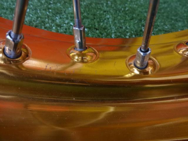 [RACING
BOY Front Wheel
CRF
Removed from a RALLY (year unknown).