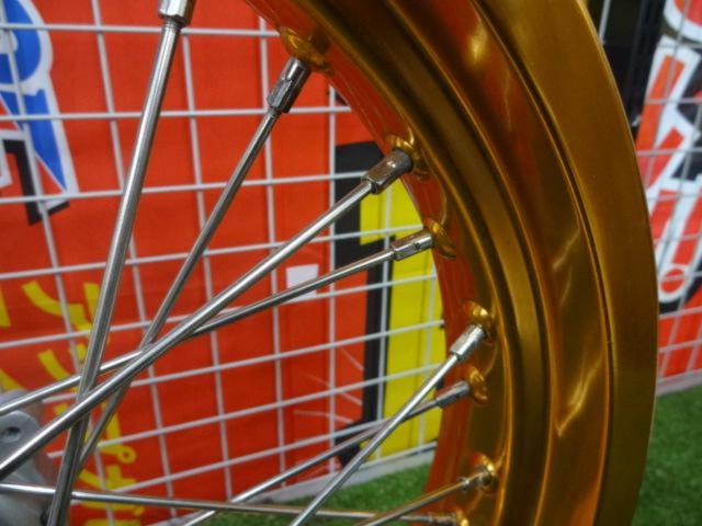 [RACING
BOY Front Wheel
CRF
Removed from a RALLY (year unknown).