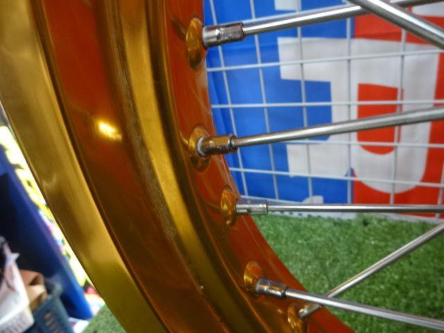 [RACING
BOY Front Wheel
CRF
Removed from a RALLY (year unknown).