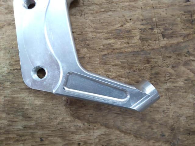 Unknown Manufacturer
Brake caliper support
[JOG]