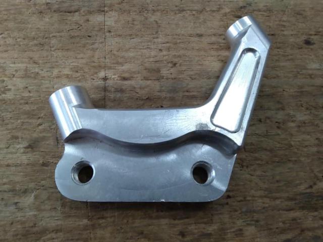 Unknown Manufacturer
Brake caliper support
[JOG]
