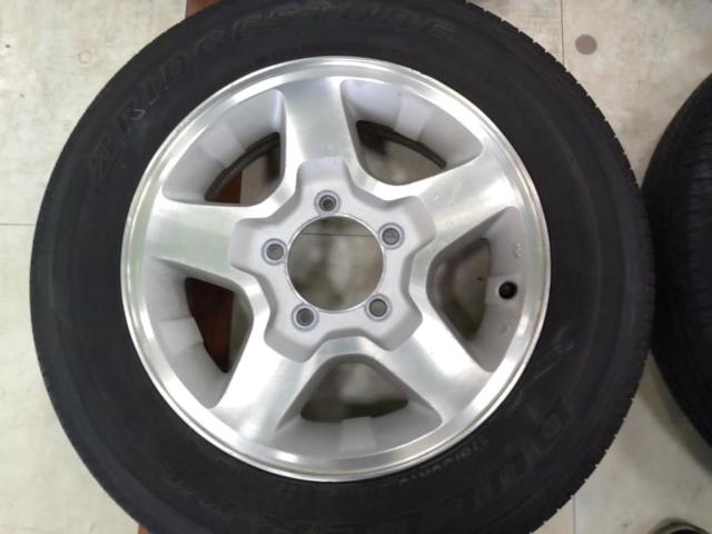 スズキ純正(SUZUKI)  JB23W ジムニー 純正アルミホイール  + BRIDGESTONE(ブリヂストン) DUELER H/L 