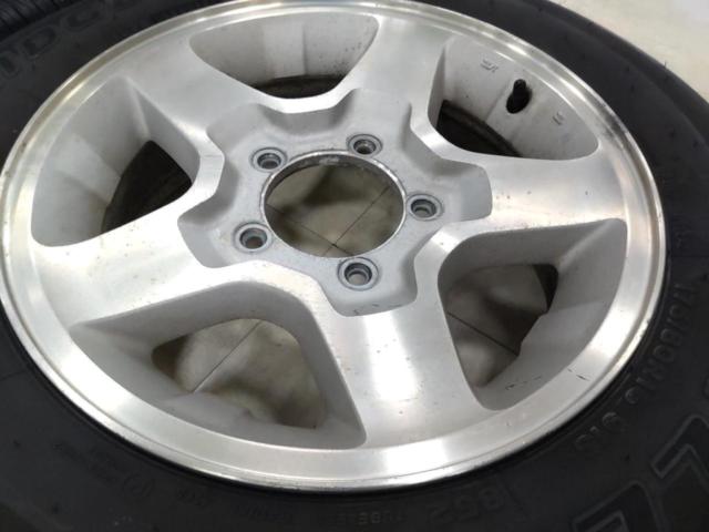 スズキ純正(SUZUKI)  JB23W ジムニー 純正アルミホイール  + BRIDGESTONE(ブリヂストン) DUELER H/L 