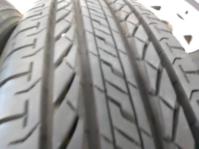 スズキ純正(SUZUKI)  JB23W ジムニー 純正アルミホイール  + BRIDGESTONE(ブリヂストン) DUELER H/L 