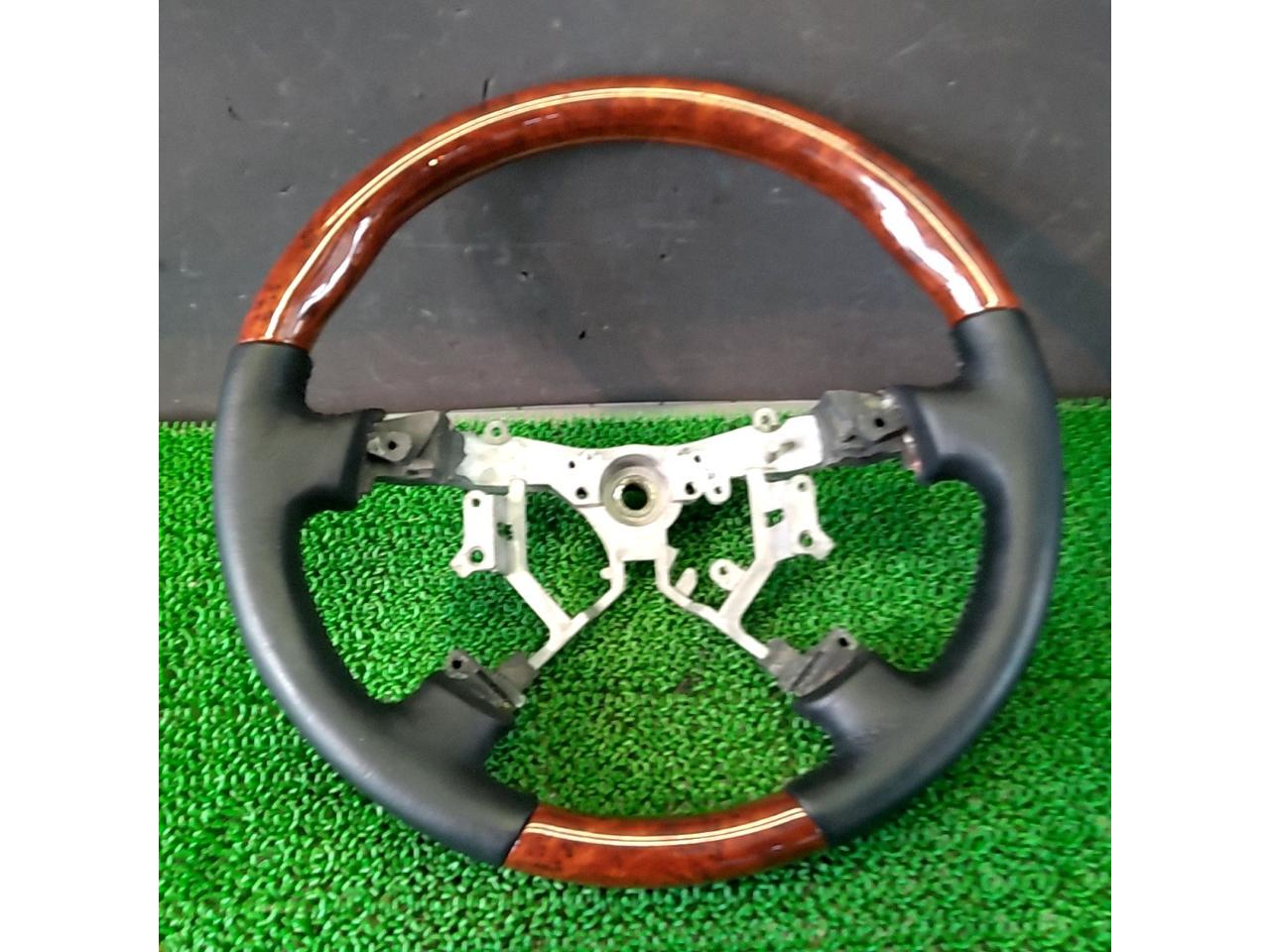 Unknown Manufacturer
Wood combination leather steering wheel