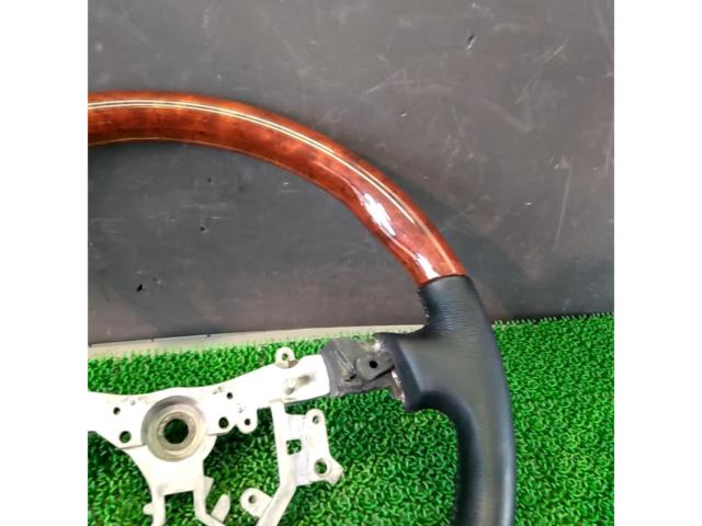 Unknown Manufacturer
Wood combination leather steering wheel