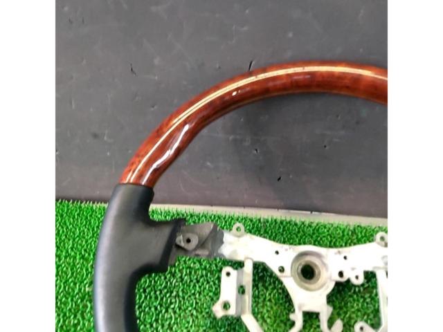 Unknown Manufacturer
Wood combination leather steering wheel