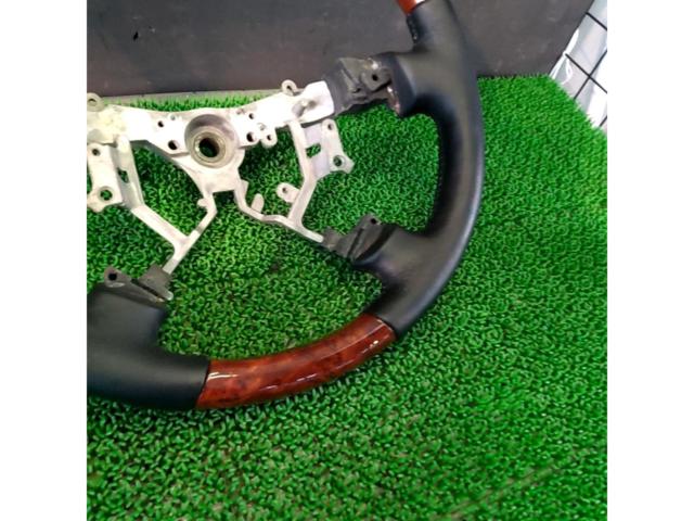 Unknown Manufacturer
Wood combination leather steering wheel