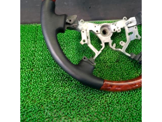 Unknown Manufacturer
Wood combination leather steering wheel
