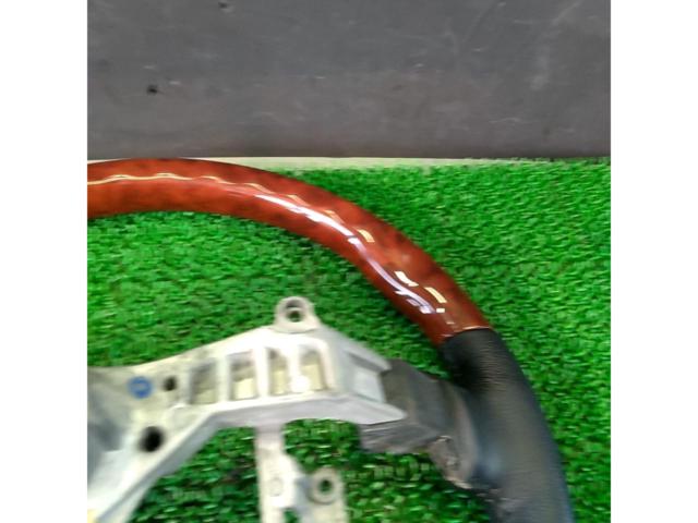 Unknown Manufacturer
Wood combination leather steering wheel