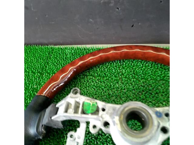 Unknown Manufacturer
Wood combination leather steering wheel