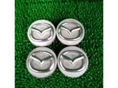 Genuine Mazda center caps removed from an Atenza.
