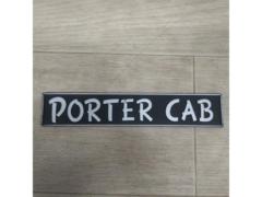  time thing 
Mazda (PORTER
CAB
Porter Cab emblem
