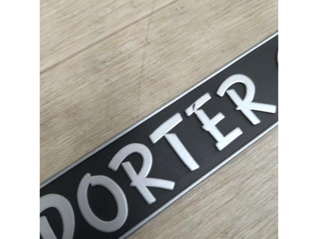  time thing 
Mazda (PORTER
CAB
Porter Cab emblem