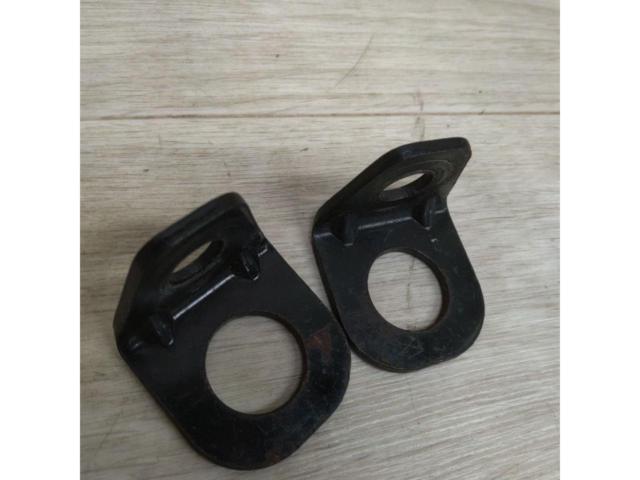 L-shaped bracket for securing a 4-point seat belt.