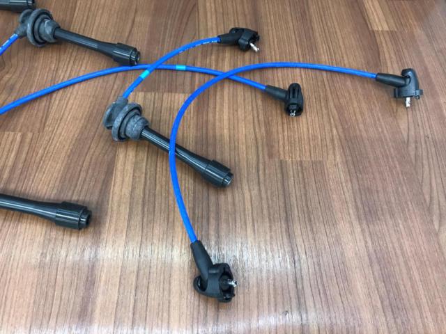 This NGK spark plug cable set (5 pieces) was intended for use in a Corolla AE111.