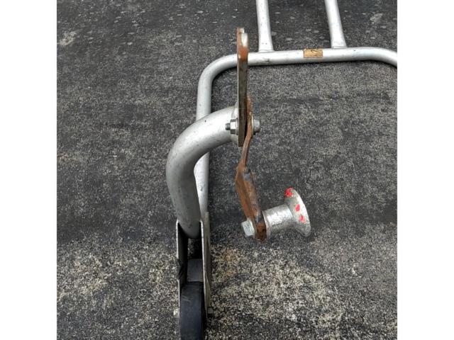 *Hook section is distorted. Manufacturer unknown. Rear maintenance stand.