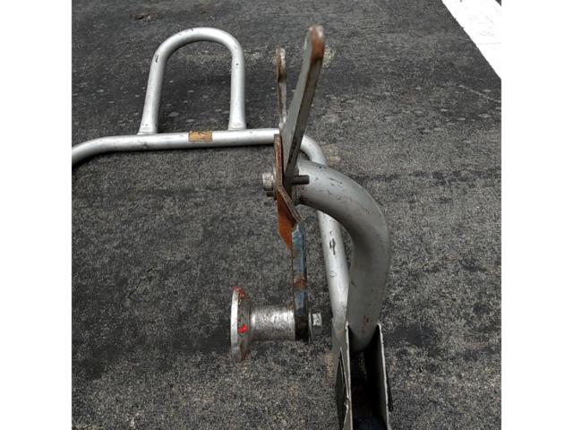 *Hook section is distorted. Manufacturer unknown. Rear maintenance stand.