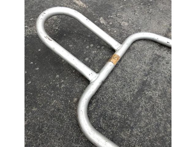 *Hook section is distorted. Manufacturer unknown. Rear maintenance stand.