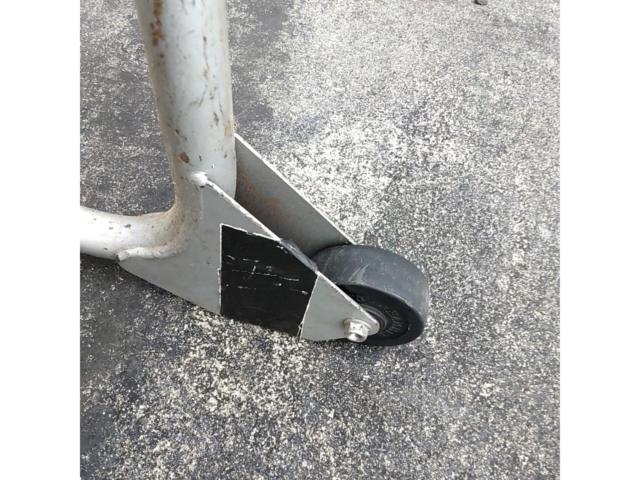 *Hook section is distorted. Manufacturer unknown. Rear maintenance stand.