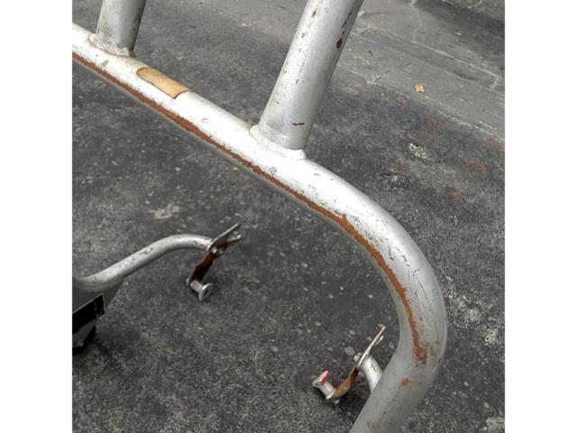 *Hook section is distorted. Manufacturer unknown. Rear maintenance stand.