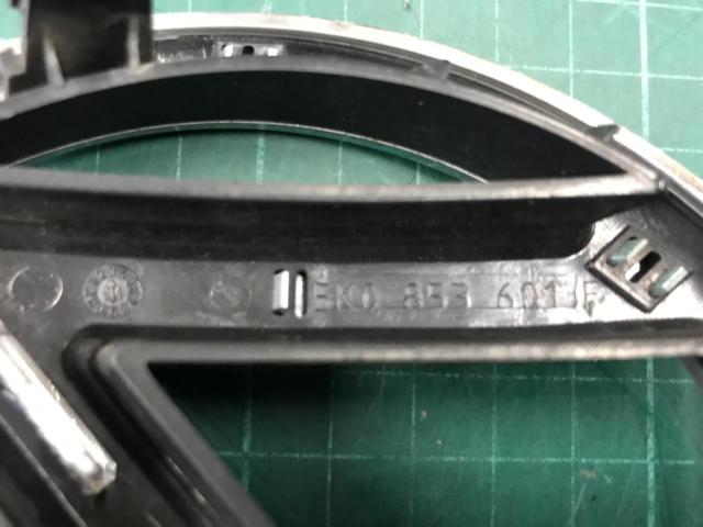 A Volkswagen Golf 6 with a minor issue.
Front grille emblem