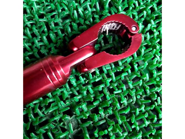 Aluminum handlebar brace from an unknown manufacturer.