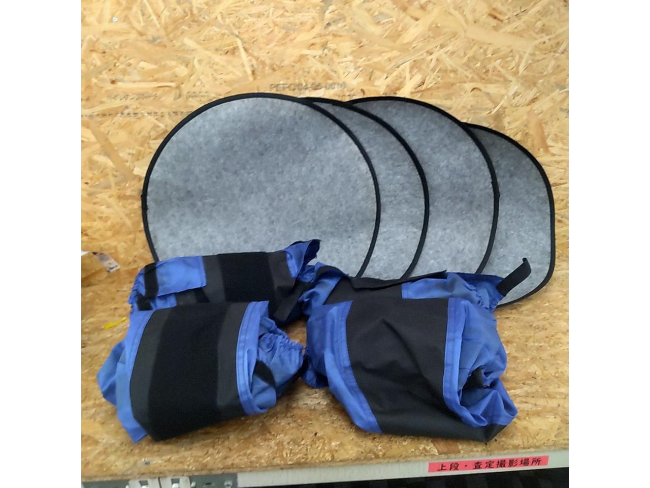 Set of 4 large tire covers (manufacturer unknown)